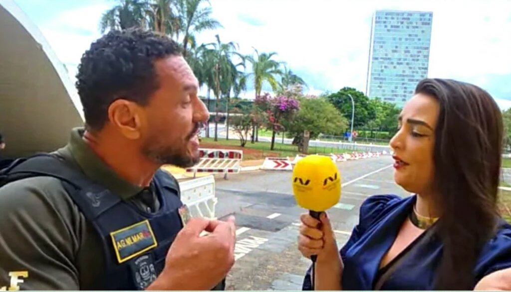 Repórter é interrompida por policial durante transmissão ao vivo na Câmara dos Deputados